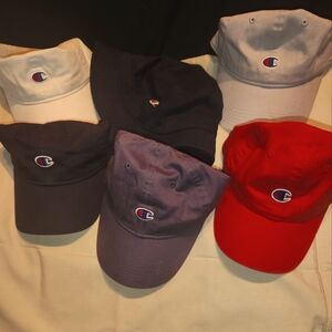 Five authentic Champion fitted hats and one bucket hat
